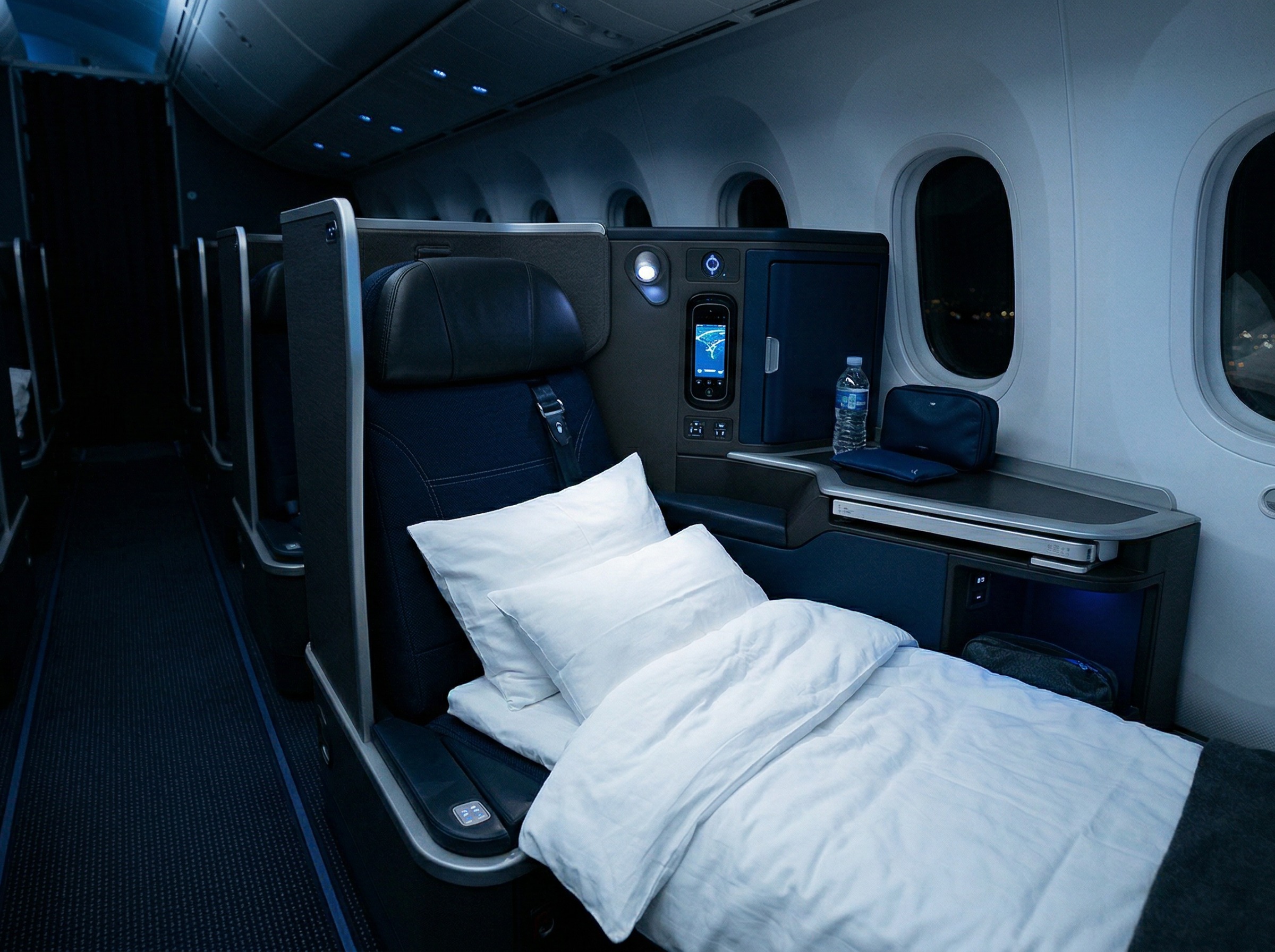 Transatlantic business class seat in lie-flat position with meal service tray